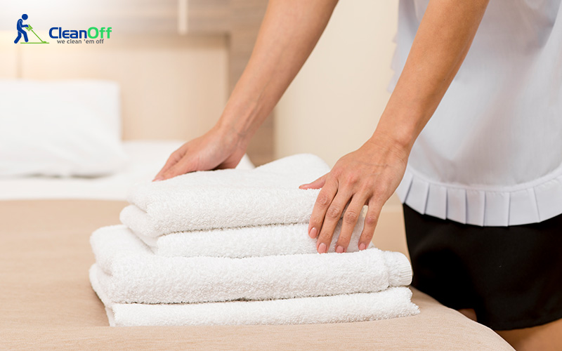 a close up of a woman during fabrics care